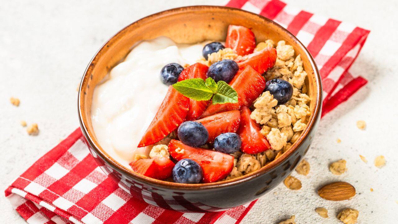 Lean protein Lean proteins like chicken or Greek yoghurt are essential for muscle repair and growth. They also help keep you feeling full for longer hours. It supports muscle recovery and helps to repair tissues after exercise, ensuring that your body has the necessary building blocks for recovery and strength. For example, Greek yoghurt with berries and granola offers proteins from yoghurt, quick carbs from berries, and crunch from granola, providing a mix of immediate and sustained energy. (Image: Canva)