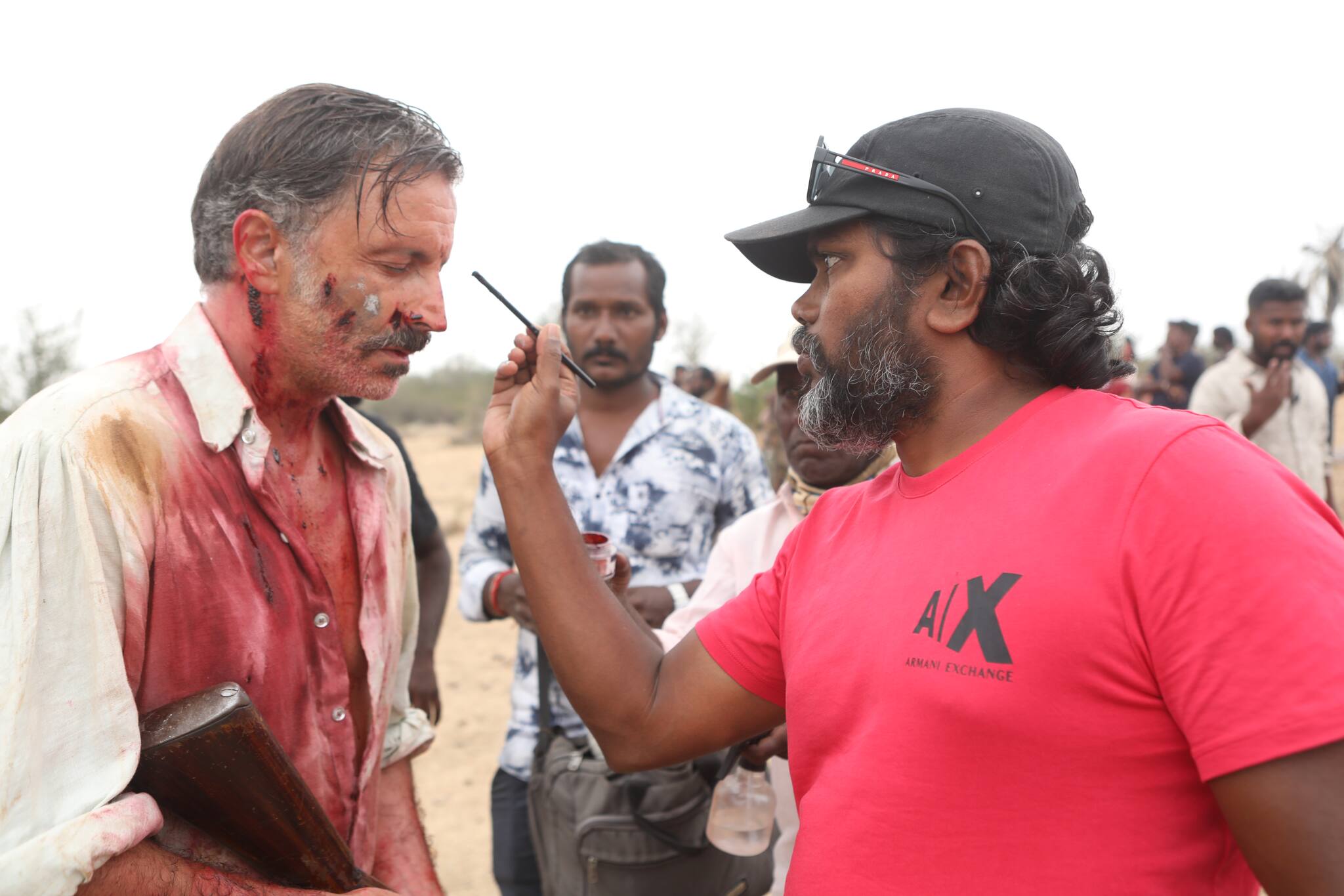 A BTS still of Daniel Caltagirone with Pa. Ranjith (right) on the sets of 'Thangalaan'.
