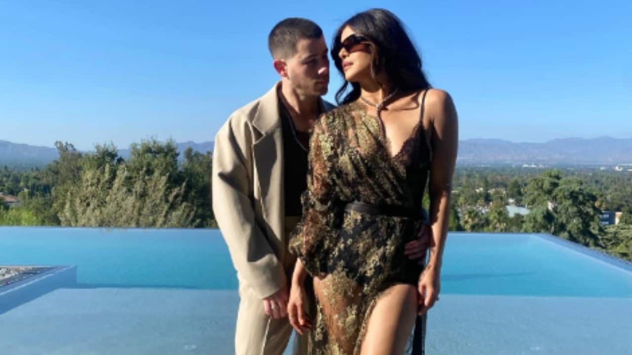 Nick Jonas shares sweet poolside photo with Priyanka Chopra as they enjoy a date night