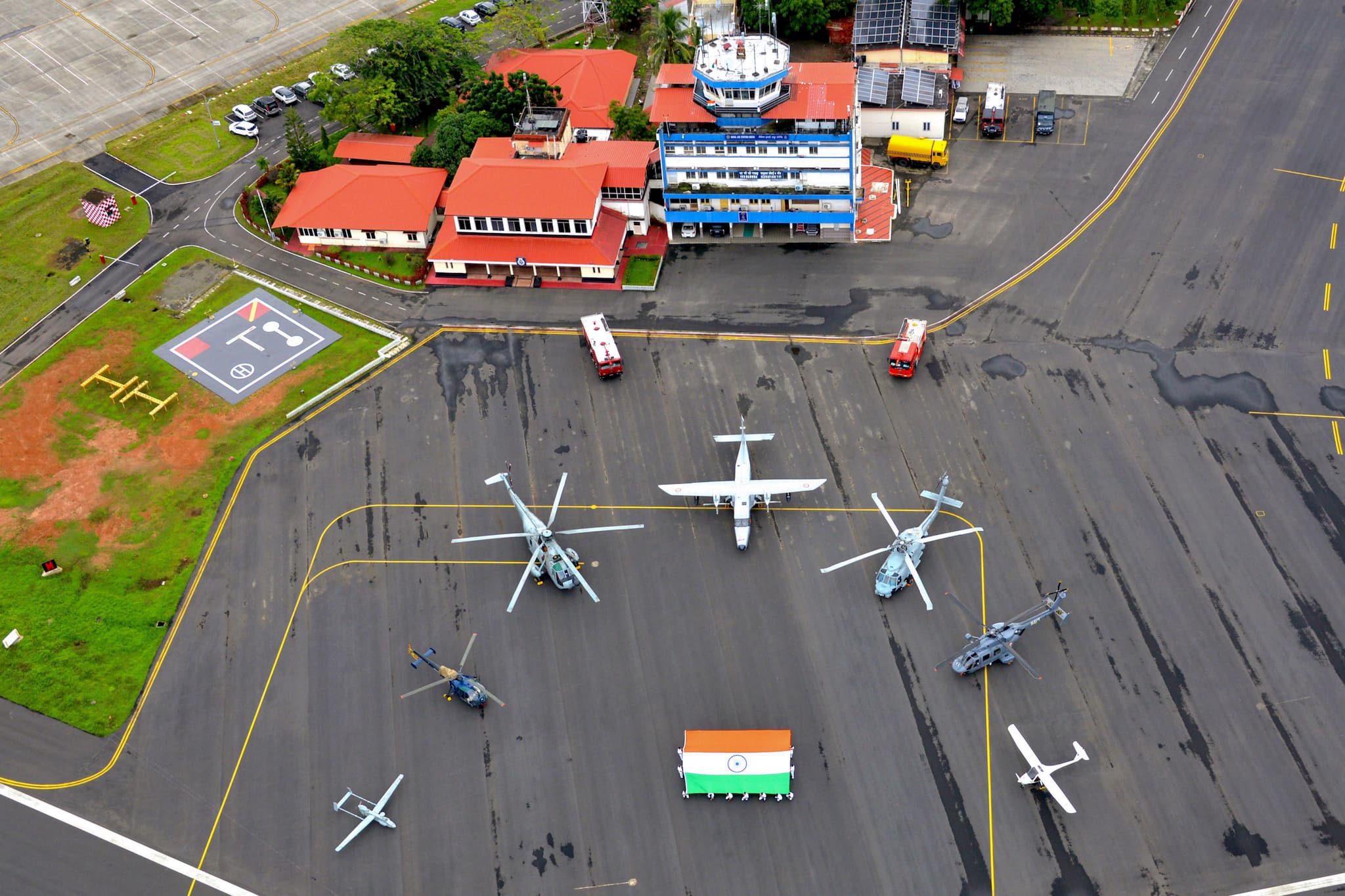 Military aircrafts on the eve of 78th Independence Day celebrations, at INS Garuda in Kochi. (PTI Photo)
