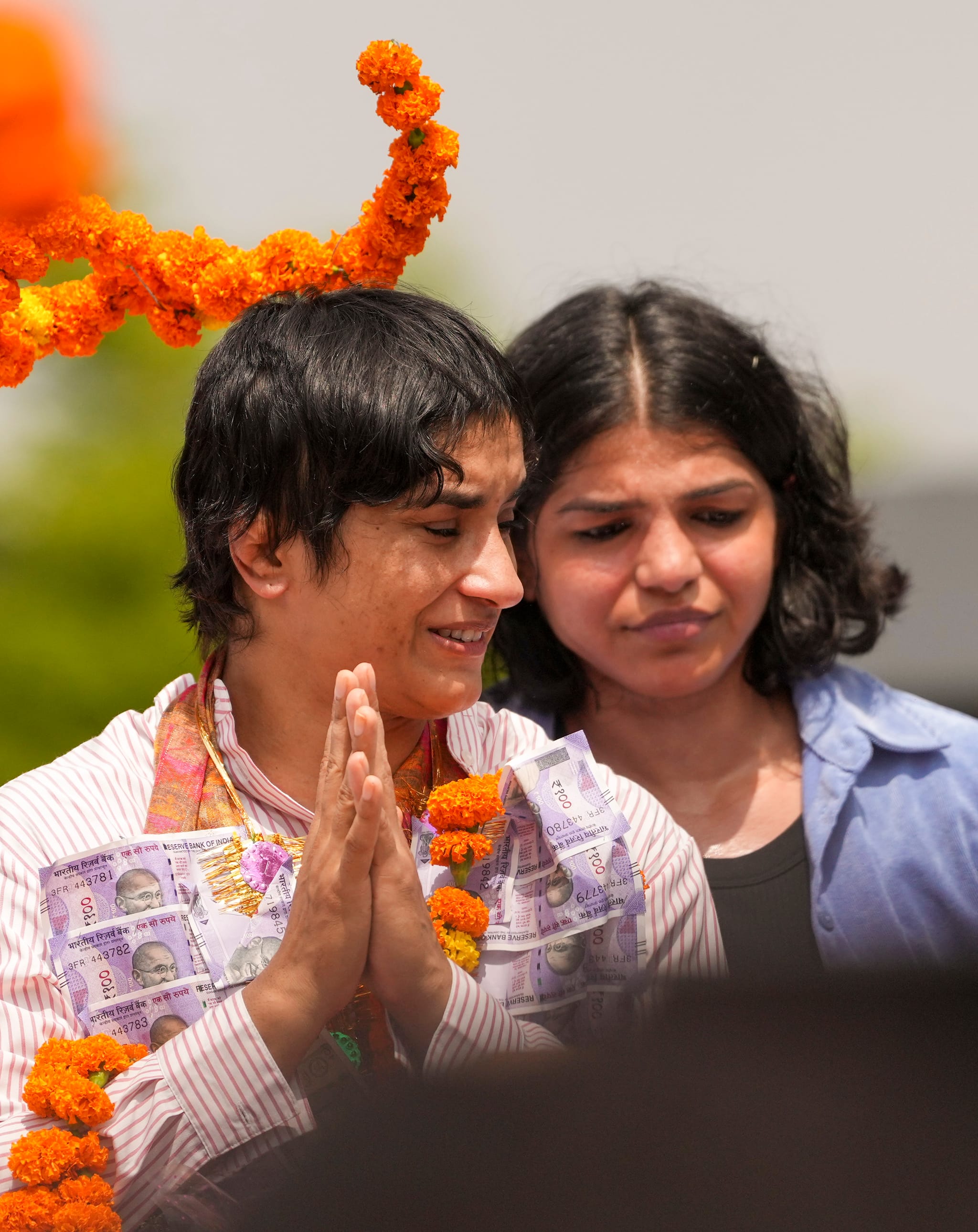 She traveled in an open Jeep, thanking supporters. &quot;I thank the entire country for support,&quot; she said, her hands folded in humility. (PTI Photo)