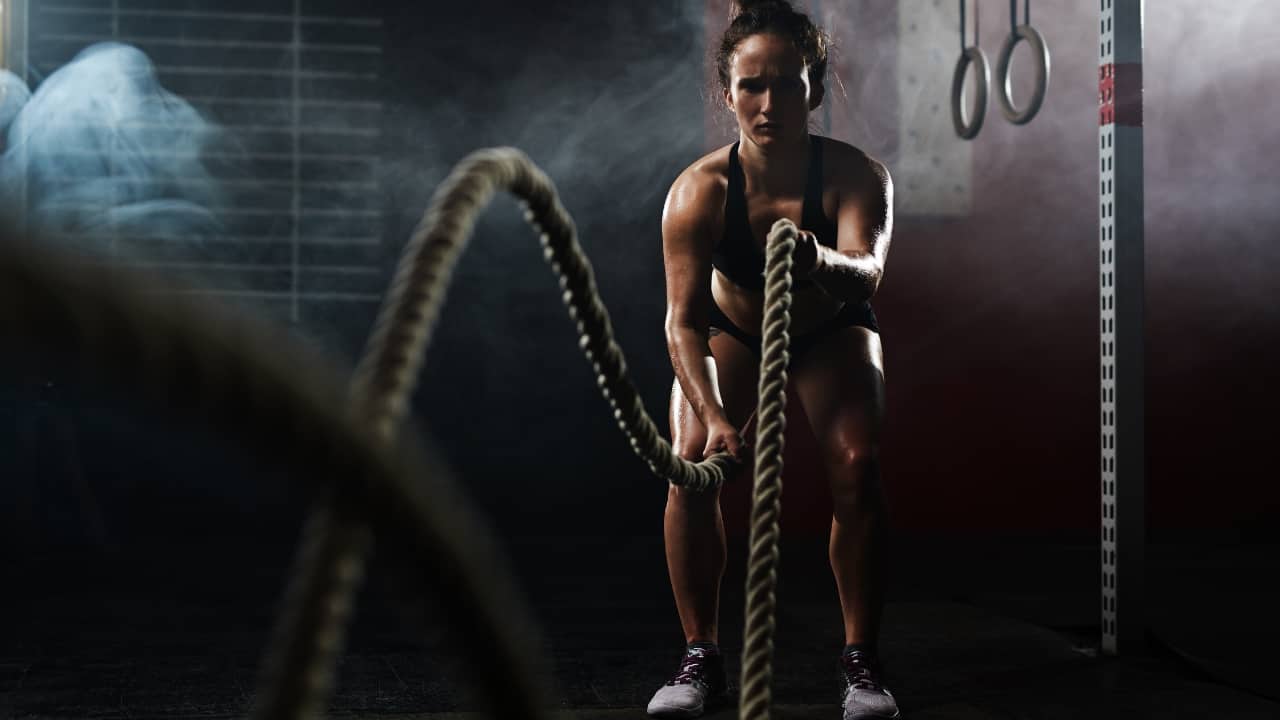 Strength training: Building muscle through strength training increases metabolism, helping the body burn more calories even at rest. It also improves body composition by reducing fat. Focus on compound exercises like squats, lunges, and push-ups to engage multiple muscle groups. (Image: Canva)