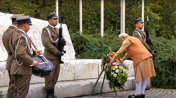 Prime Minister Narendra Modi lays a wreath as he pays tribute at the Monument to Battle of Monte Cassino, in Warsaw, Poland, (PTI Photo)
