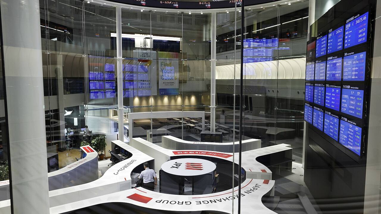 Asian equities climb ahead of key US Fed, Bank of Japan events