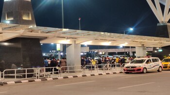 Passengers waiting for cabs at Kempegowda International Airport in Bengaluru. Picture credit: @aashikajoshi