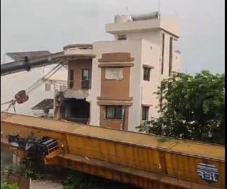 Watch: Huge crane smashes plush Surat bungalow near metro site
