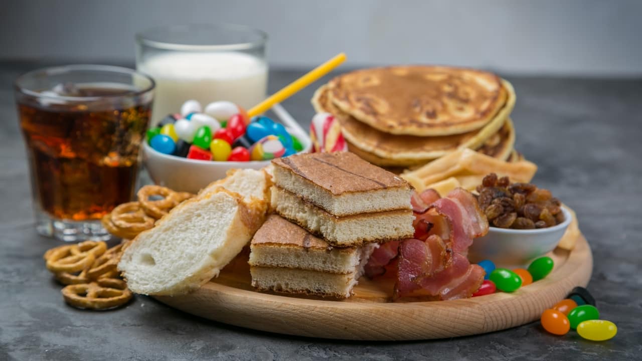 Limit sugar and processed foods Reduce your intake of sugary and highly processed foods, which can trigger inflammation and disrupt the balance of healthy gut bacteria. These foods often contain trans fats, refined sugars, and artificial additives that promote inflammatory responses. By limiting them, you can lower your risk of developing chronic inflammation-related conditions like metabolic syndrome and type 2 diabetes. (Image: Canva)