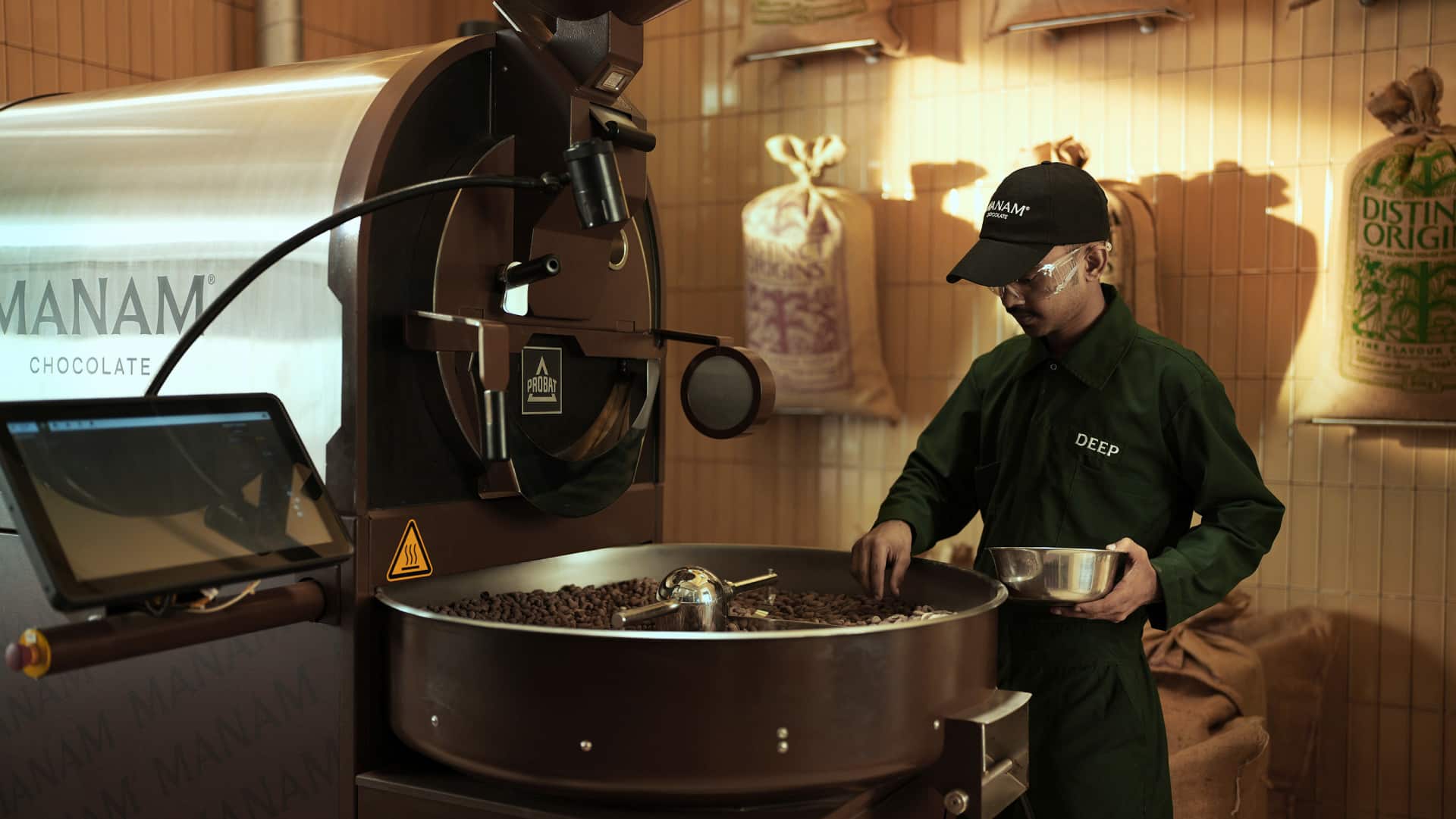 Fermented and dried cacao is then roasted and ground into a fine paste. (Photo by Siddharth Govindan via Manam)