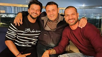 Suresh Raina, Virender Sehwag, and Shikhar Dhawan pose for a photo