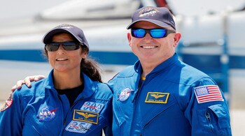 NASA astronauts Butch Wilmore and Suni Williams pose ahead of the launch of Boeing's Starliner-1 Crew Flight Test (CFT)