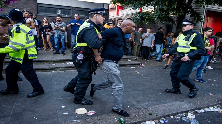 Notting Hill Carnival marred by violence as eight stabbed, hundreds ...