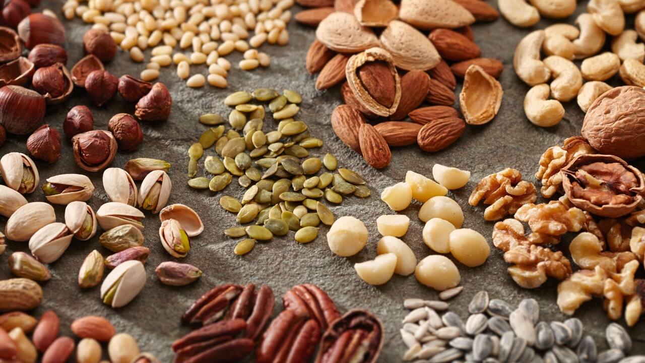 Nuts and seeds Almonds, walnuts, flaxseeds, and chia seeds are packed with omega-3 fatty acids, protein, and fibre, promoting heart health and reducing inflammation. Enjoy a handful of nuts as a snack, sprinkle seeds over yoghurt or oatmeal, or blend them into smoothies. (Image: Canva)