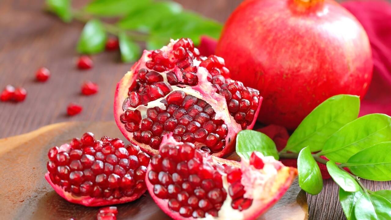 Pomegranate: Rich in antioxidants and phytoestrogens, pomegranates promote uterine health, enhance fertility, and balance estrogen levels (Image: Canva)