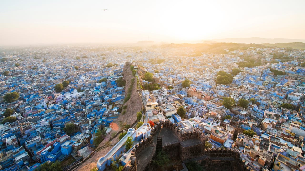 Jodhpur Airport, Rajasthan Surrounded by the stark beauty of the Thar Desert, Jodhpur Airport offers stunning aerial views of golden sand dunes and majestic forts, capturing Rajasthan’s desert charm. (Image: Canva)