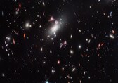 NASA’s Webb captures distorted galaxy forming cosmic question mark; check out the stunning images