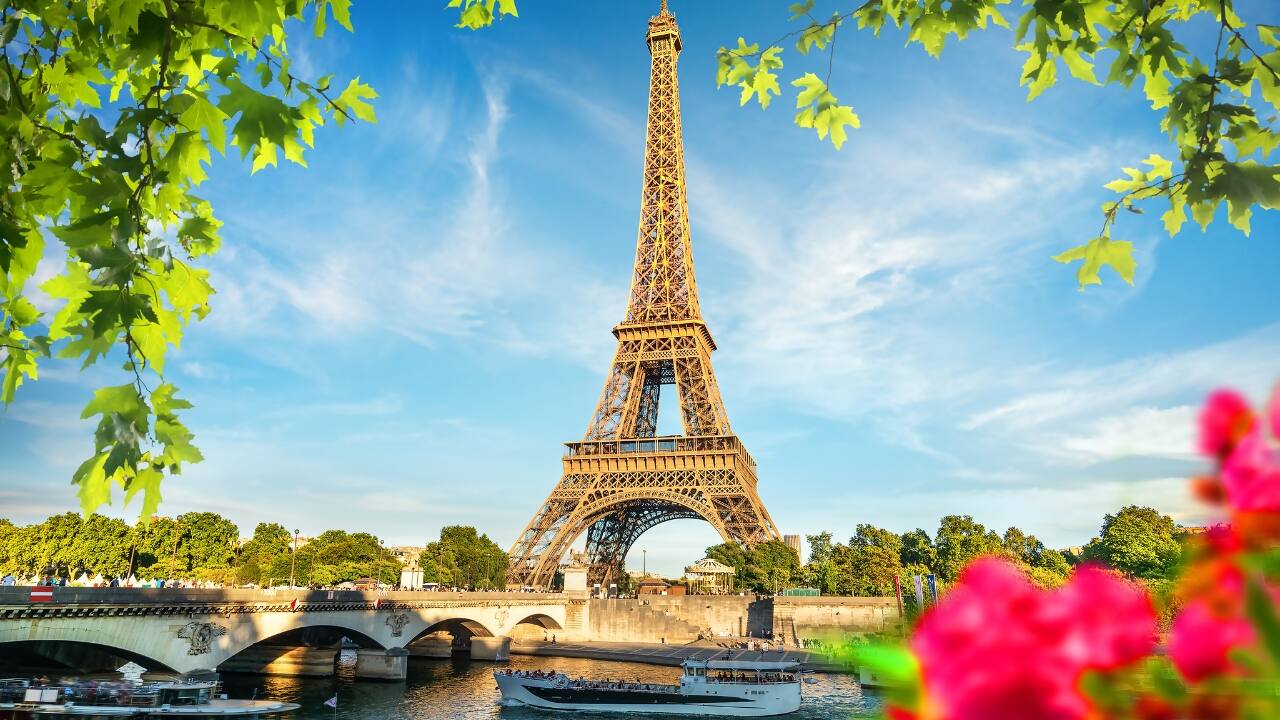 4. Paris, France: The City of Dreams for Solo Travelers Paris captivates with its iconic landmarks, world-class art, and charming streets. The city offers a romantic and inspiring environment, perfect for solo explorers seeking beauty and sophistication. (Image: Canva)