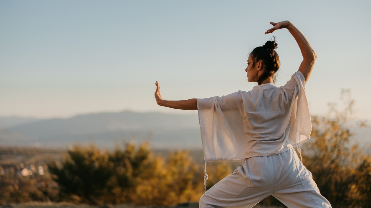 Tai Chi: Tai Chi is a gentle, low-impact exercise that improves balance, flexibility, and coordination. It’s particularly effective for reducing the risk of falls in older adults. Tai Chi also promotes relaxation and mental clarity, helping to maintain cognitive health and physical resilience. (Image: Canva)