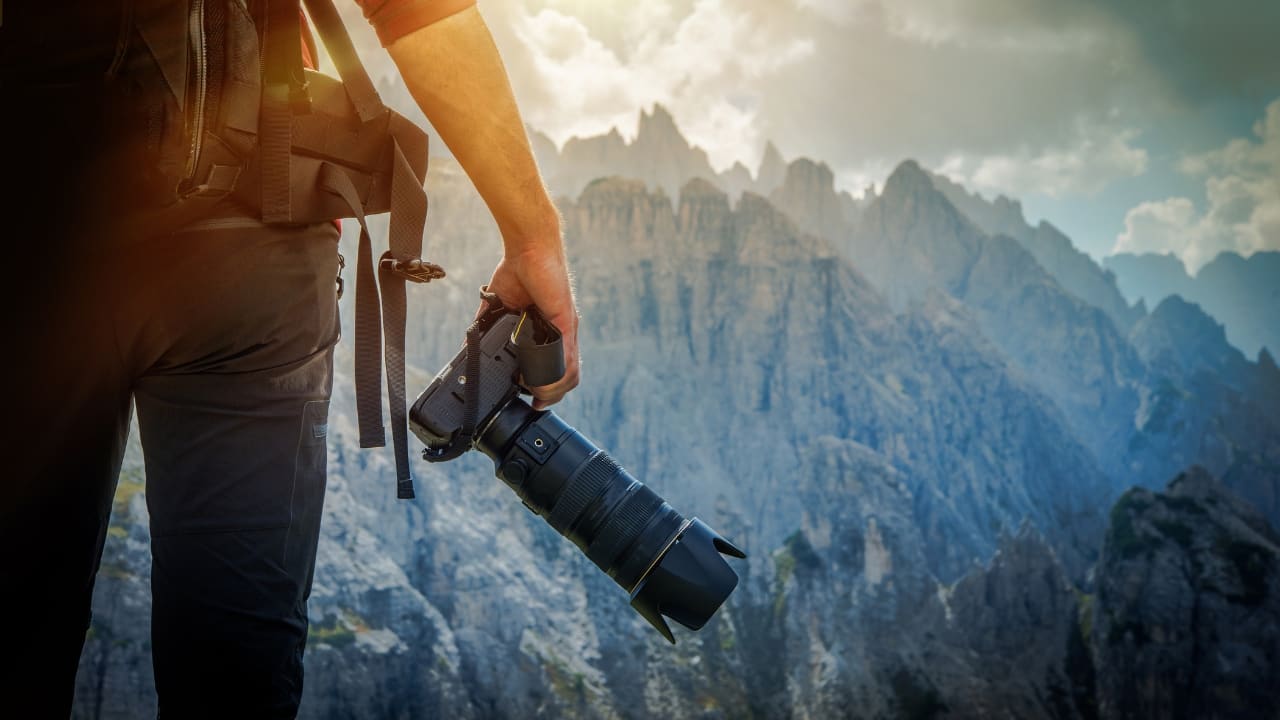 Tip 1: Choose the Right Equipment Elevate your safari adventure with the right camera gear! Equip yourself with a DSLR or mirrorless camera paired with a powerful telephoto lens (at least 200mm) to capture breathtaking close-ups of India’s exotic wildlife from a safe distance. A sturdy tripod or monopod will steady your shots and make those spontaneous moments crystal clear, turning your safari into a photographic journey of a lifetime. (Image: Canva)