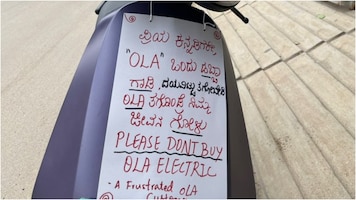 Bengaluru customer, frustrated with Ola e-scooter, hangs placard urging people not to buy it. See post