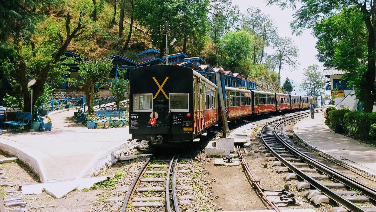 4. Barog, Himachal Pradesh | Barog, a quaint hill station in Himachal Pradesh, is perfect for those seeking peace and natural beauty. The vistadome coach journey to Barog reveals stunning vistas of deep gorges, rolling hills, and the serene countryside, providing a visual retreat from the hustle and bustle of city life. (Image: Unsplash)