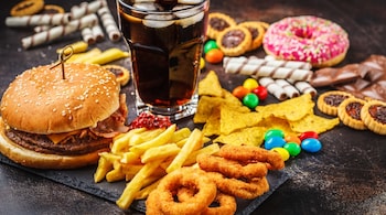 Processed foods like snacks with high salt content can contribute to inflammation and increase the risk of colorectal cancer. (Image: Canva)