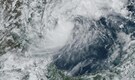 Hurricane Milton weakens as it marches across central Florida, homes destroyed