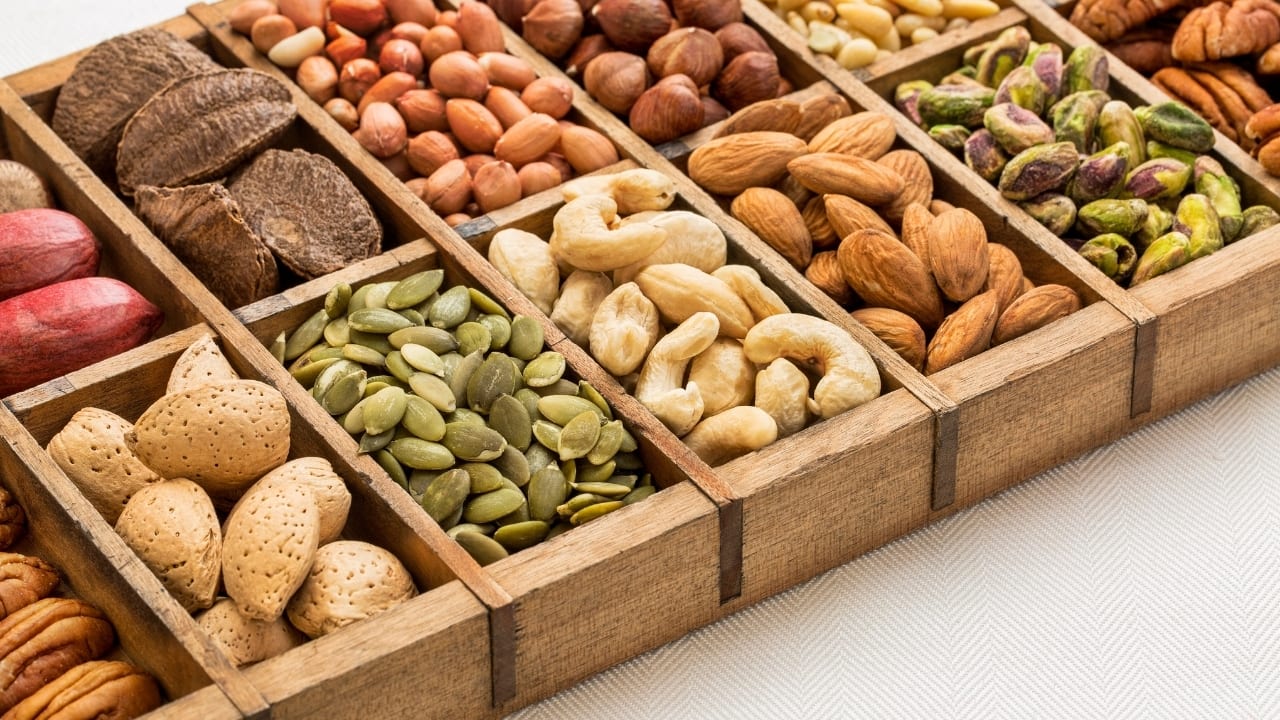 Nuts and seeds: Nuts and seeds are excellent sources of calcium and phosphorus, two essential minerals for strengthening enamel. Sesame seeds, in particular, help remove plaque and remineralize teeth, reducing the risk of decay (Image: Canva)