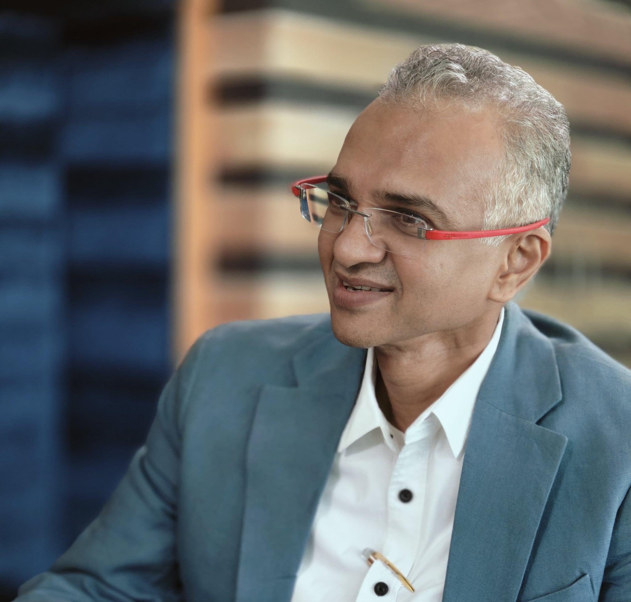 NPCI CEO Dilip Asbe hints at UPI market cap deadline extension
