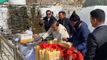 During his visit on Sunday, October 20, Ambani was seen wearing a white kurta-pajama paired with a beige Nehru jacket