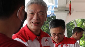 FILE PHOTO: Lee Hsien Yang of the Progress Singapore Party meets residents ahead of the general election in Singapore June 30, 2020. REUTERS/Dawn Chua/File Photo