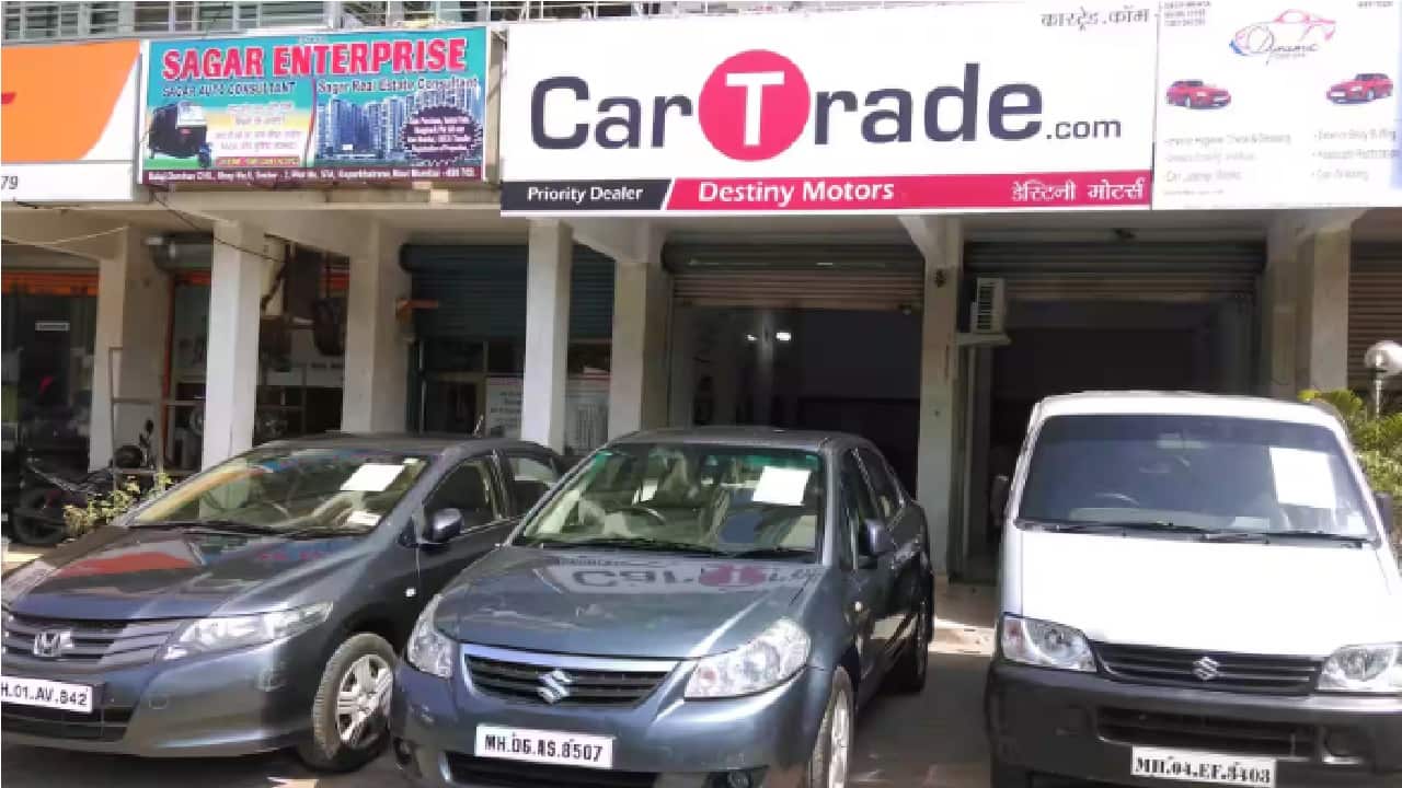 CarTrade shares rise up to 5% after firm confirms holding talks to acquire CarDekho