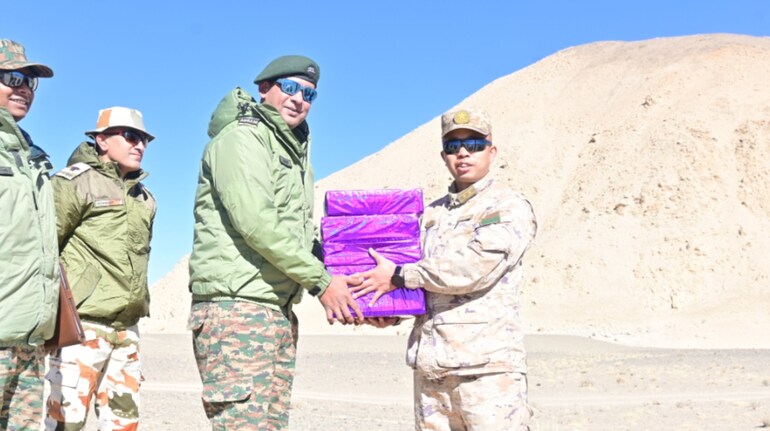 Pictures: Indian, Chinese troops exchange sweets at LAC on Diwali