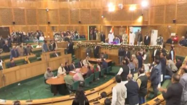 Watch: Chaos in J&K Assembly after Engineer Rashid's brother displays  Article 370 banner