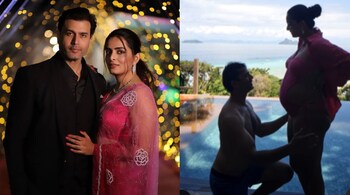 In the clip, Ruhi, dressed in a pink monokini, turns to reveal her baby bump as Shivendraa lovingly kisses it.