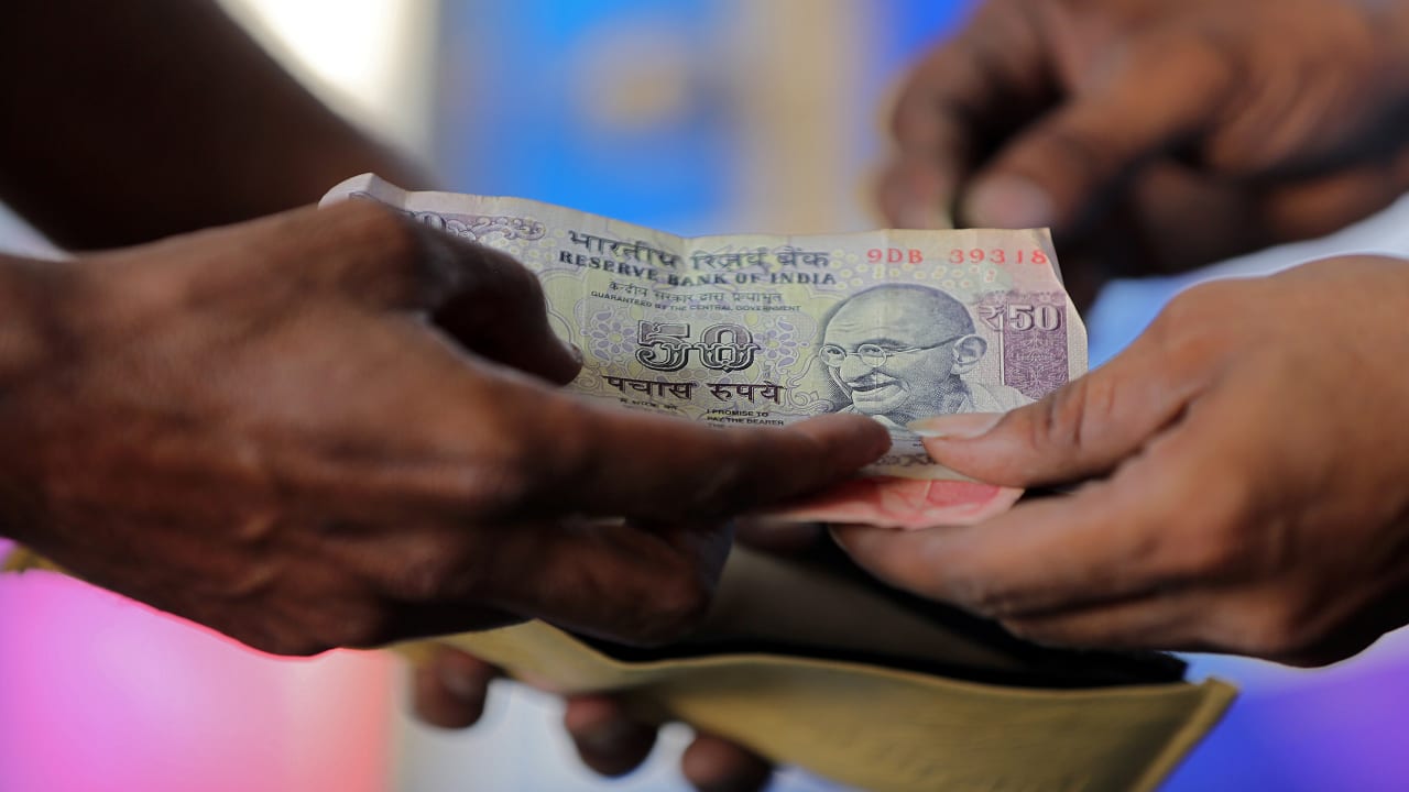 Rupee Hits Record Low, RBI Intervention Averts Sharp Losses