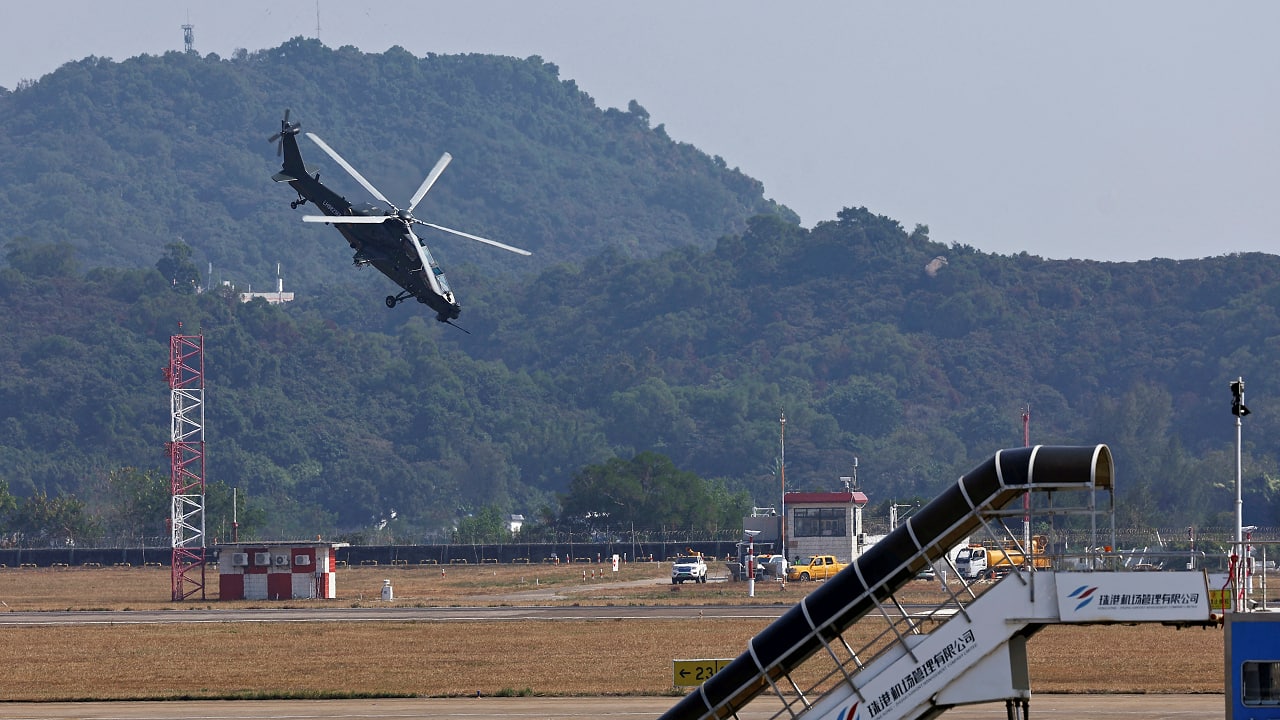 A Z-10 attack helicopter flies in the sky at the China International Aviation and Aerospace Exhibition, or Airshow China, in Zhuhai, Guangdong province, China A Z-10 attack helicopter flies in the sky at the China International Aviation and Aerospace Exhibition, or Airshow China, in Zhuhai, Guangdong province, China