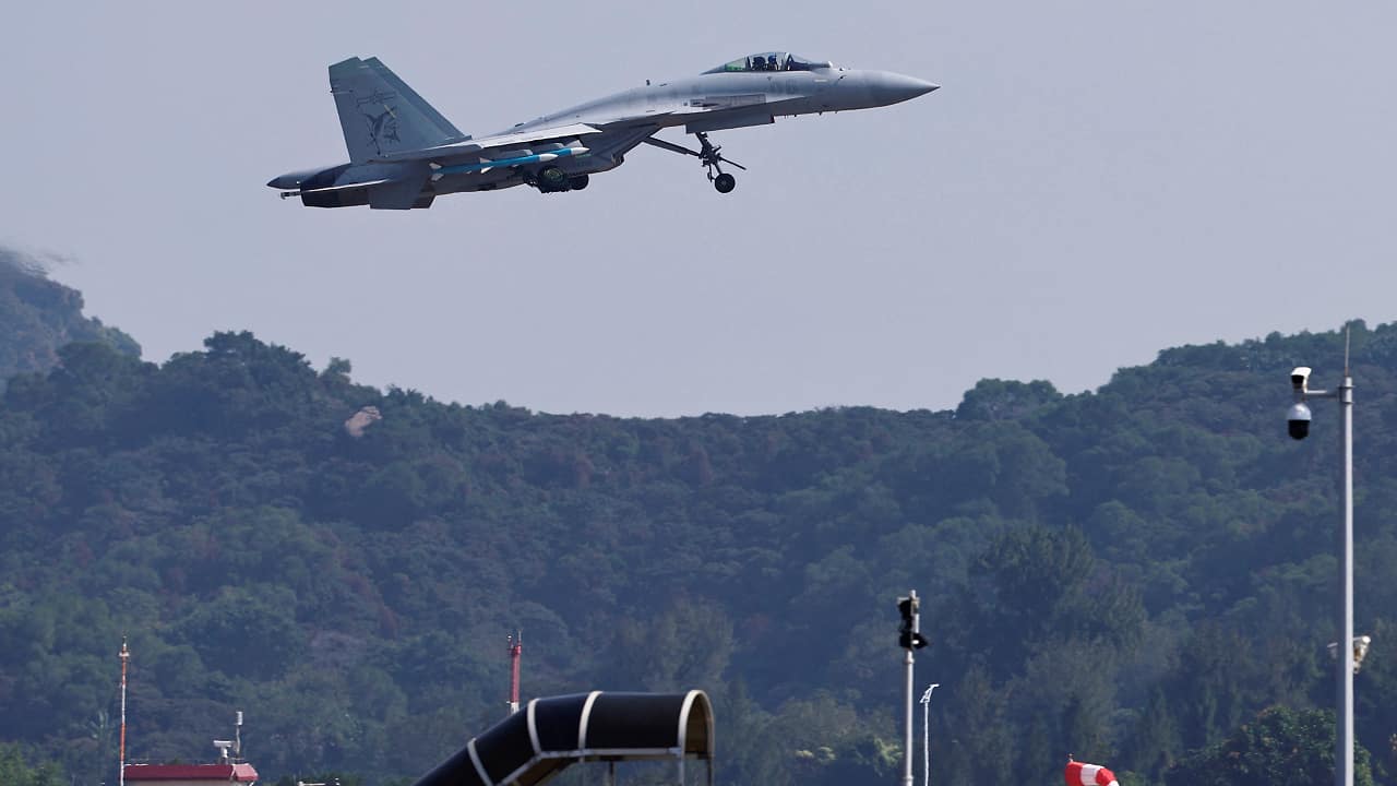 A J-15T carrier-borne fighter jet of Chinese People's Liberation Army (PLA) Navy flies in the sky at the China International Aviation and Aerospace Exhibition, or Airshow China, in Zhuhai, Guangdong province A J-15T carrier-borne fighter jet of Chinese People's Liberation Army (PLA) Navy flies in the sky at the China International Aviation and Aerospace Exhibition, or Airshow China, in Zhuhai, Guangdong province