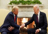 Biden greets Trump with handshake, both pledge smooth transition