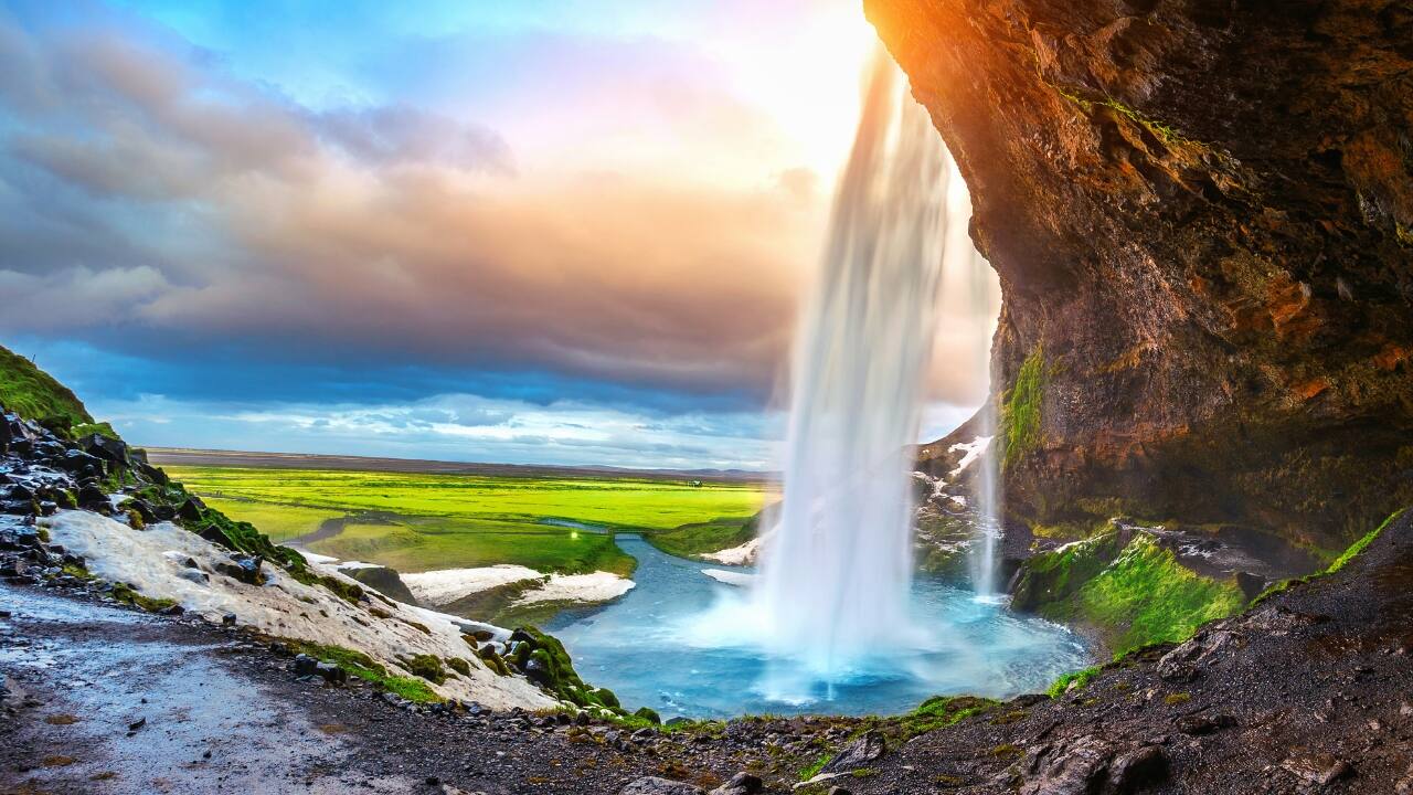 Seljalandsfoss waterfall during the sunset in Iceland. (Image: Canva)