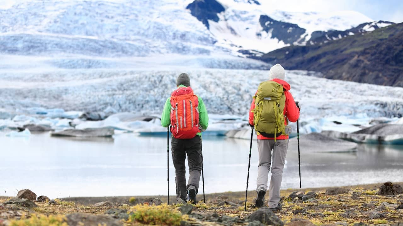 People on adventure travel in Iceland. (Image: Canva)