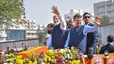 PM Modi with Eknath Shinde and Devendra Fadnavis (PTI)