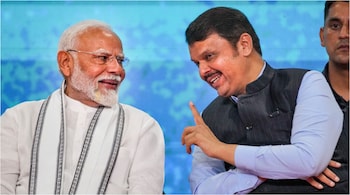 Modi and Fadnavis PTI