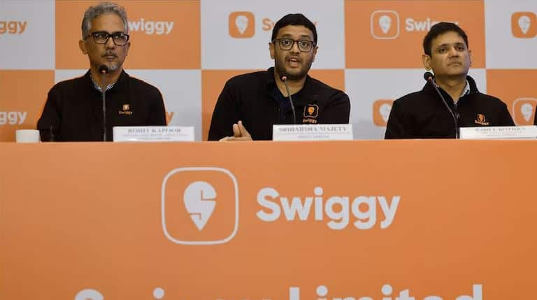 Swiggy shares briefly slip under IPO price of Rs 390, reverse intraday losses