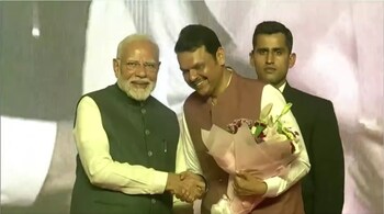Devendra Fadnavis greets Prime Minister Narendra Modi after taking oath as the 18th Chief Minister of Maharashtra. (Screengrab)