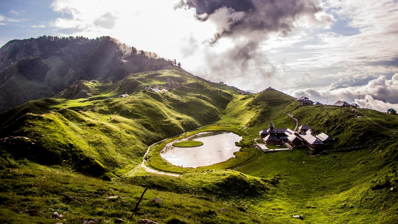 Prashar Lake: A floating island amidst hills, where tranquility reigns supreme. (Image: Canva)