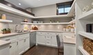 Open kitchen layouts: Declutter, tackle odours, invest in storage solutions for a clean, organised look