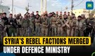 Syria War | Syria's Al-Sharaa Merges Former Rebel Factions Under Defence Ministry | N18G Syria War | Syria's Al-Sharaa Merges Former Rebel Factions Under Defence Ministry | N18G