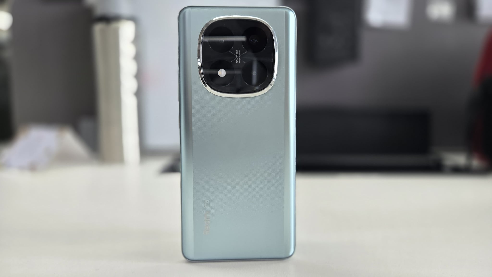 Redmi Note 14 Pro 5G<br />Camera specifications: 50MP primary (Sony LYT-600, OIS), 8MP ultrawide, 2MP macro. Key capabilities: The Sony LYT-600 sensor offers a large aperture for increased light intake. Xiaomi's imaging engine focuses on detail retention and dynamic range in high-contrast scenarios like sunsets. Price: ~Rs 21,199