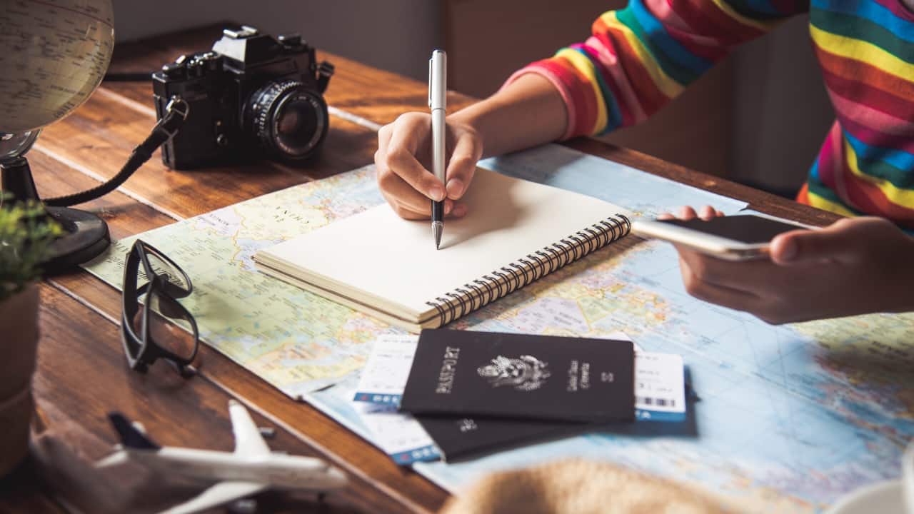Start 2025 with a fresh approach to travel—pack, plan, and explore! (Image: Canva)