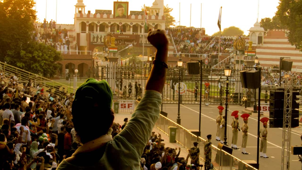 2. Wagah Border, Punjab The Wagah Border ceremony is a unique display of patriotism and tradition, held daily at the India-Pakistan border. The lively and synchronized flag-lowering ceremony draws huge crowds, making it one of India’s most iconic border attractions. If you’re in Punjab, this emotional experience is not to be missed. (Image: Unsplash)